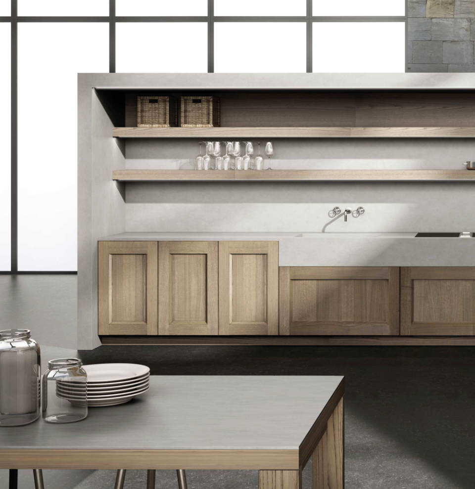 Modern kitchen with a minimalist dining table, pendant light, and a large shelving unit showcasing neatly arranged dishware and decor.