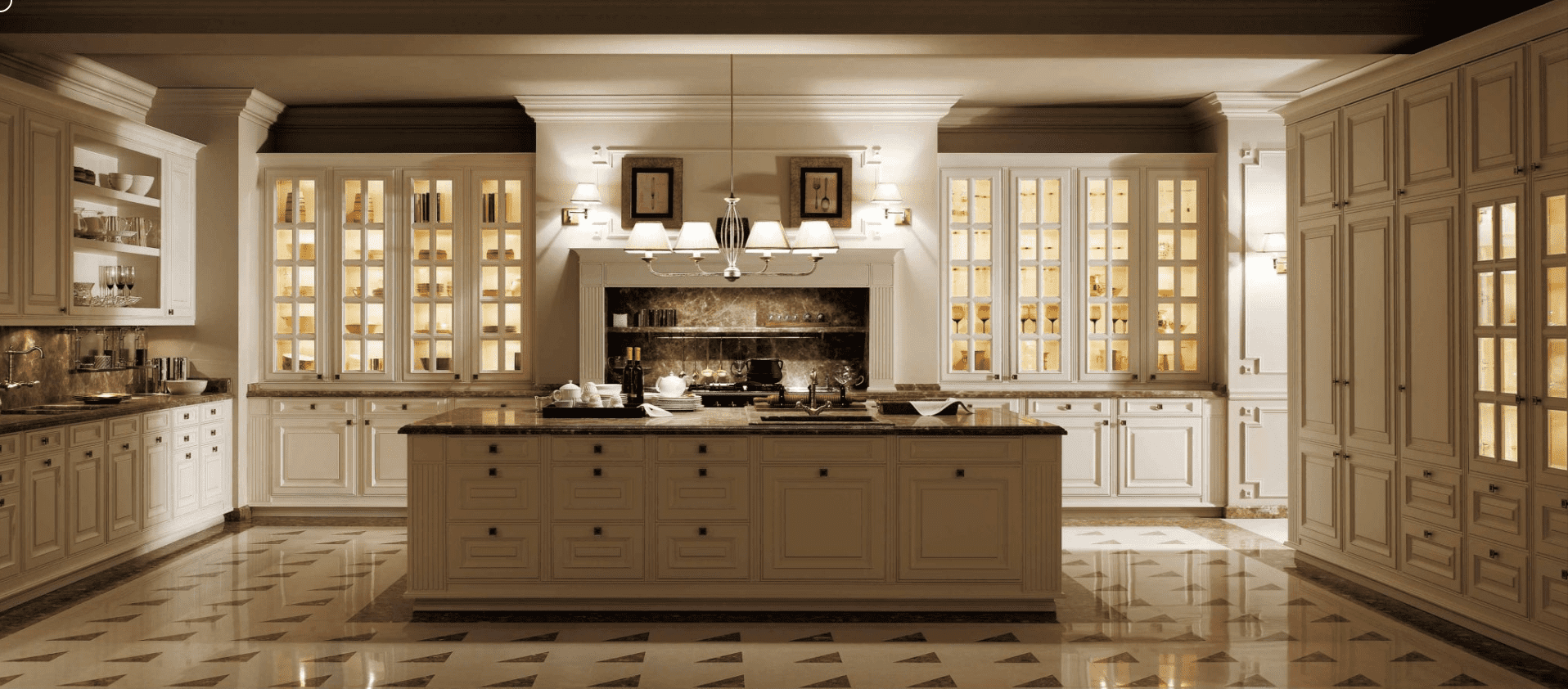 Luxurious European-style kitchen featuring white cabinetry, ambient lighting, intricate crown moldings, and a spacious central island with a marble countertop.